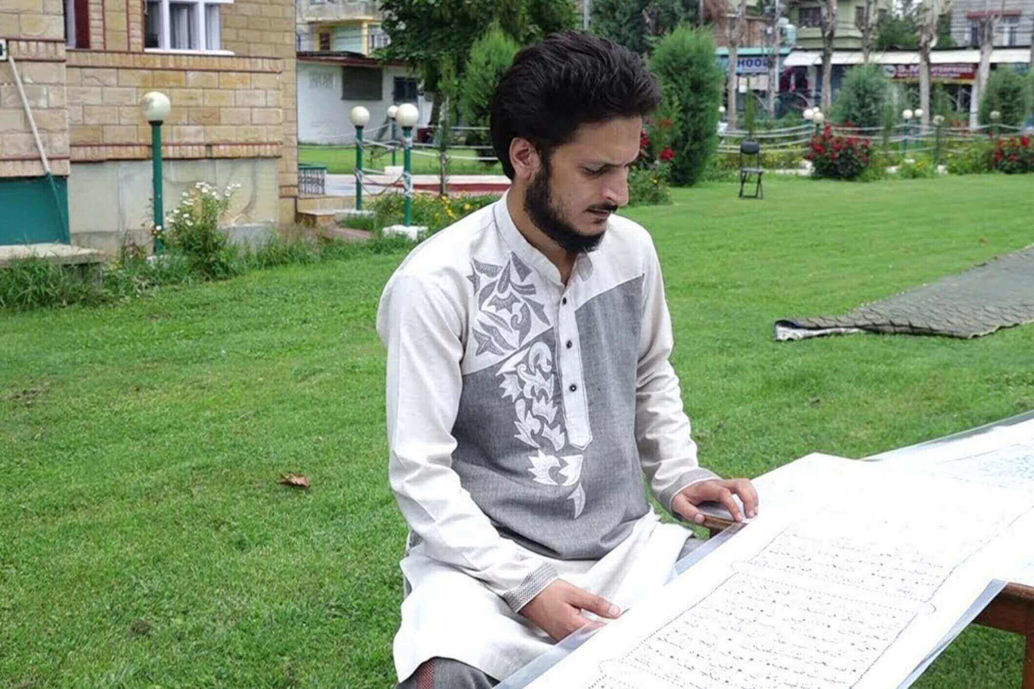 Kashmiri Man Writes The Quran Pak On The Longest Single Sheet Of Paper